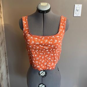 This cute pink floral thank top from Forever 21 is a size medium!